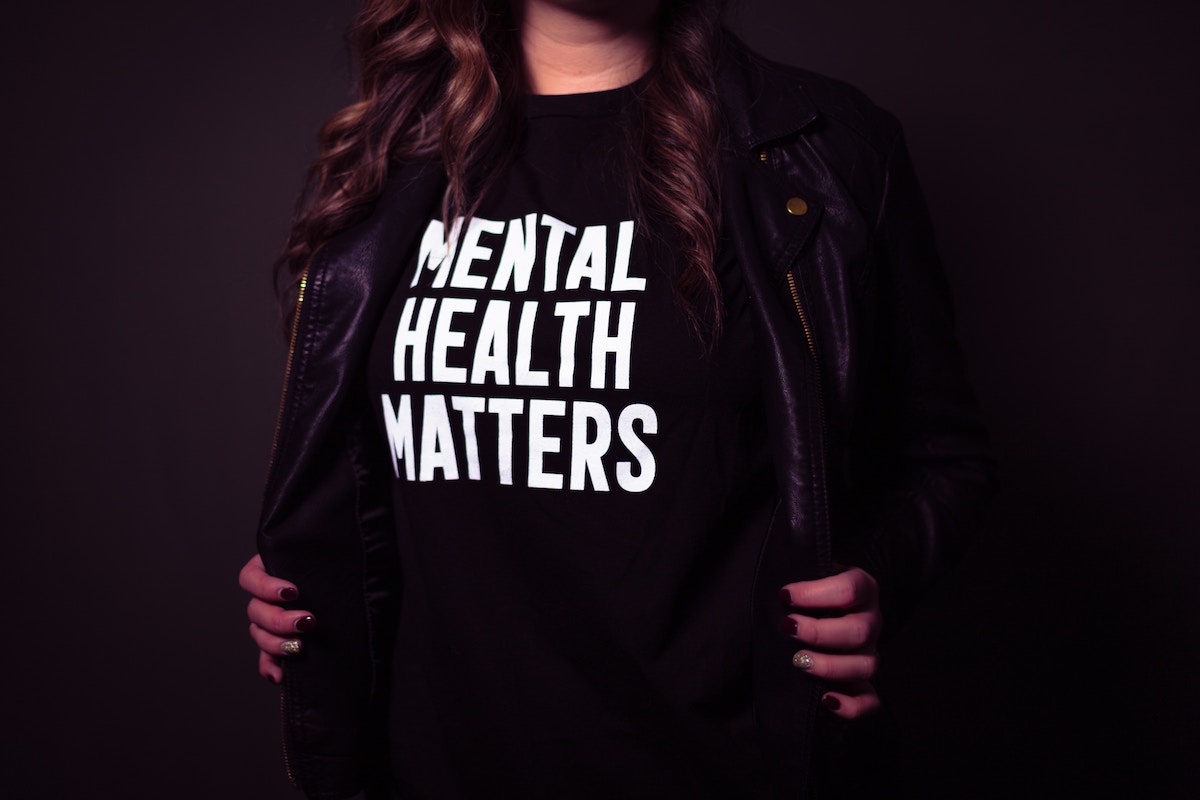 Woman wearing a shirt that says Mental Health Matters